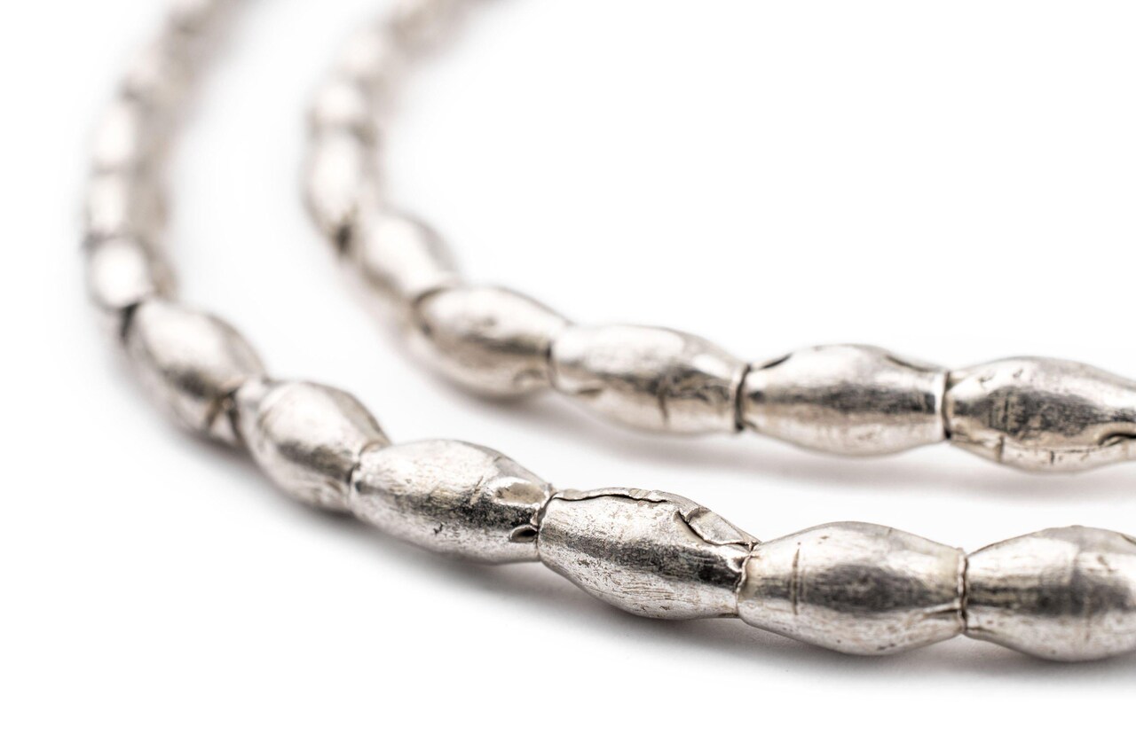 The Bead Chest Ethiopian White Metal Oval Beads 9x5mm African Silver 30 Inch Strand Handmade